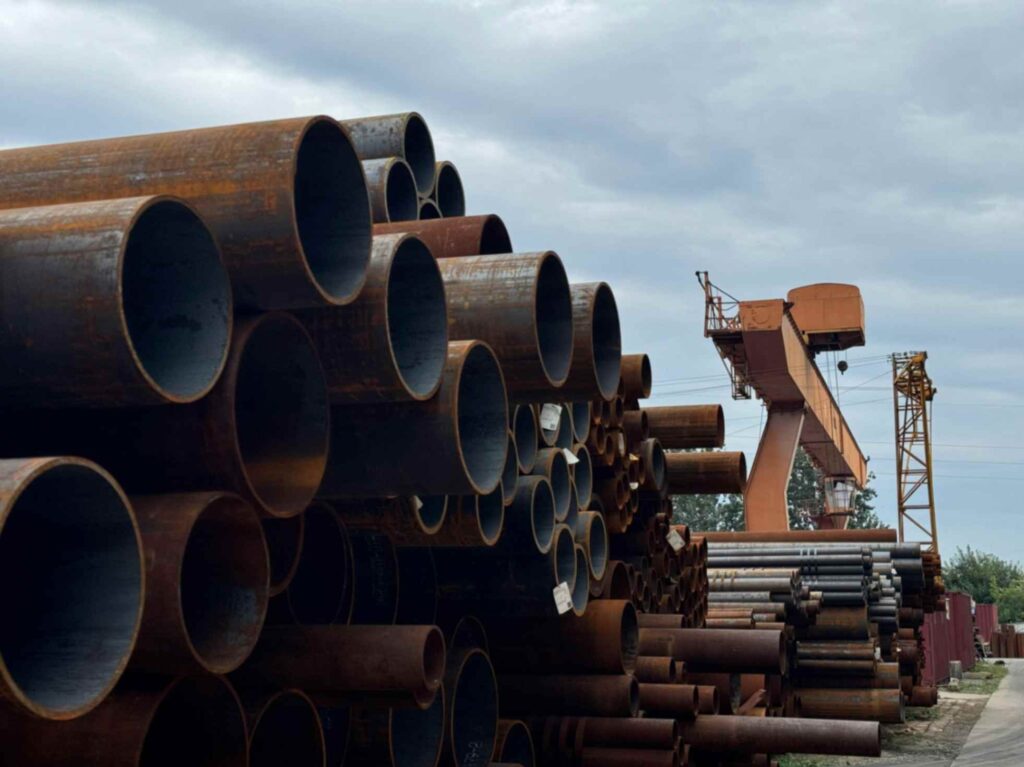 Stacked metal pipes showing different diameters and wall thickness